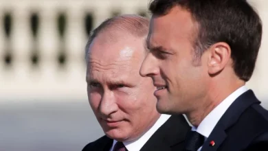 Vladimir Putin junto a Emmanuel Macron.